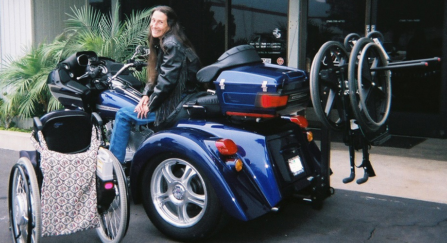 Happy handi-cap rider and wheel chair rack